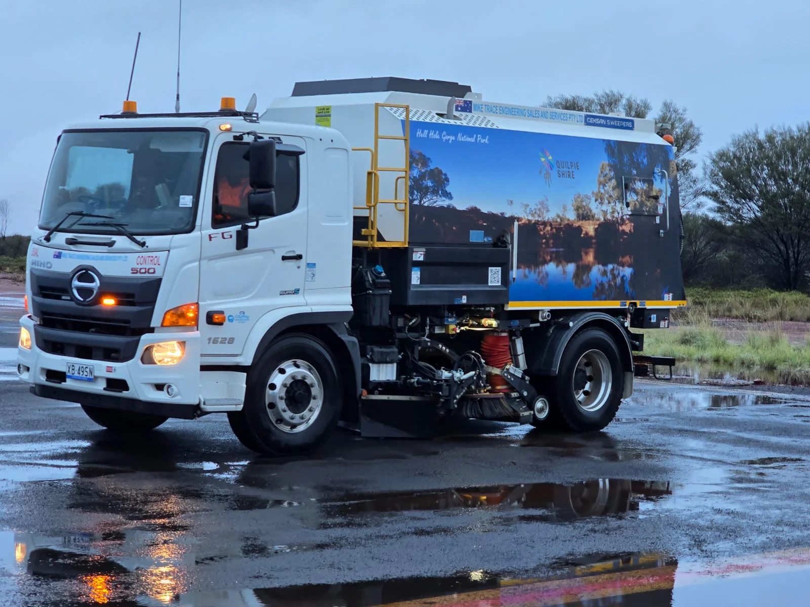 CityRay sweeper clearing floodwater from Quilpie airport runway